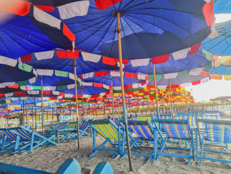colorful beach umbrellas and canvas bedの写真素材