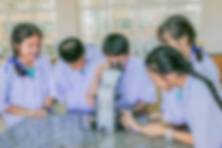 blurry pictures of students Learn the science of chemistry in the school lab. happy students is a...