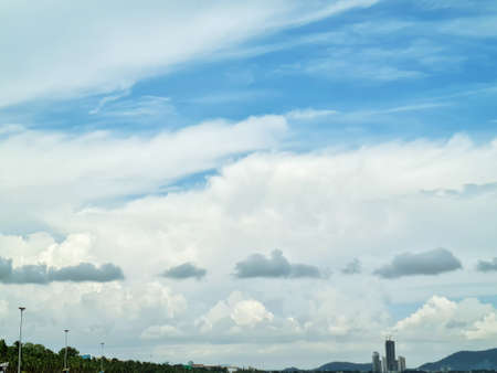 blue sky at dusk and city buildingsの写真素材
