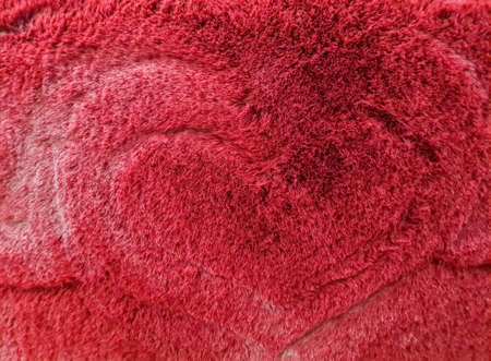 dark red heart shaped rug For Valentine's Day card background. love, passion