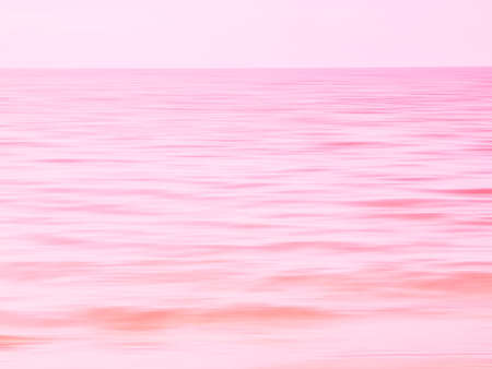 Motion blur composing of the sweet pink sea.の写真素材