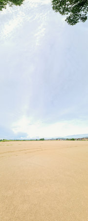 Vertical panorama of yellow sky and ground.の写真素材