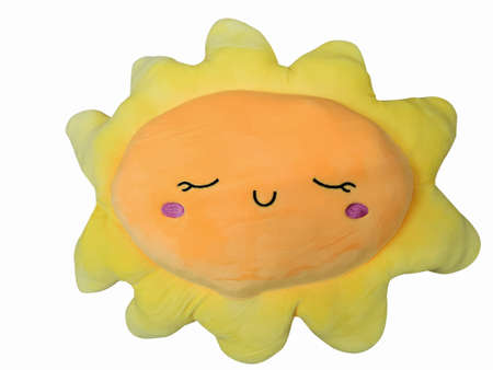 pillow in the form of the sun isolated white backgroundの写真素材