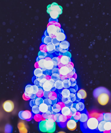 Christmas abstract blur background light bokeh from Xmas tree at night party in winter.の素材
