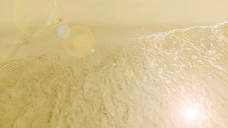 Natural blurred defocused background for concept summer vacation. Nature of tropical summer beach with rays of sunlight.の写真素材