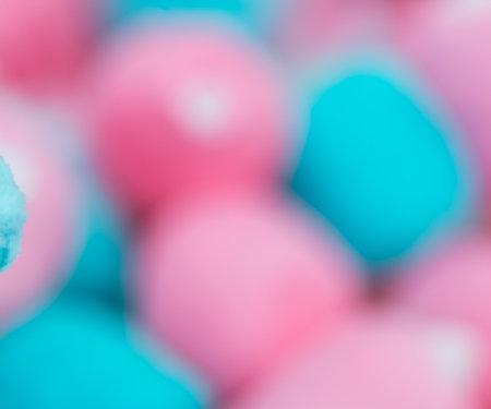 Blue and pink cotton candy with swirl and blur.の素材