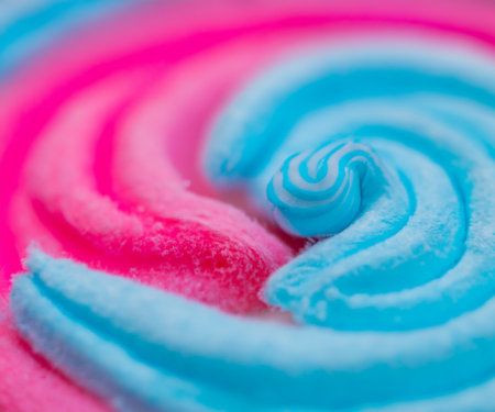Blue and pink cotton candy with swirl and blur.の素材