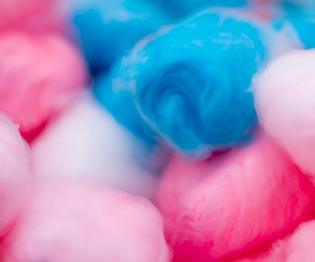 Blue and pink cotton candy with swirl and blur.の素材