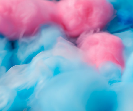Blue and pink cotton candy with swirl and blur.の素材