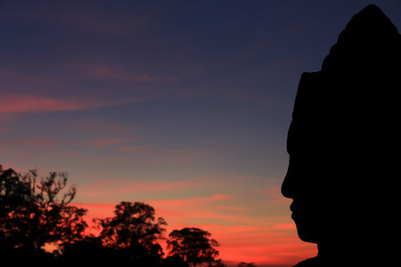 Silhouette of Buddha in Angkor Wat temple (Cambodia)の写真素材