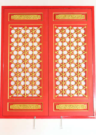 The red window with gold texture in chinese style.の写真素材