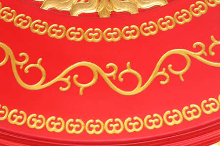 Gold texture on red wood chinese style.の写真素材