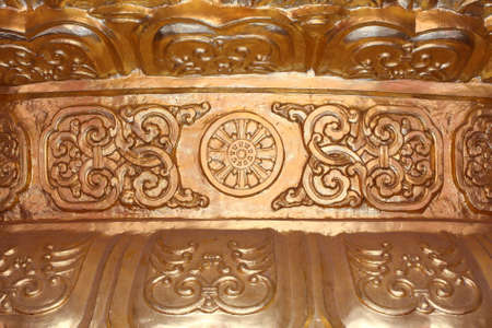 Gold texture chinese style, on base of modeling buddha.の写真素材