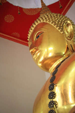The face of golden buddha, Wat Pho, bangkok, Thailand.の写真素材