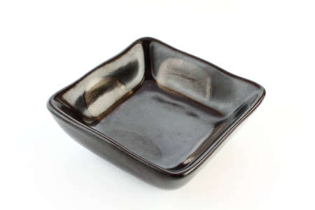 japanese ceramic bowl for  sauce. On white paper.の写真素材
