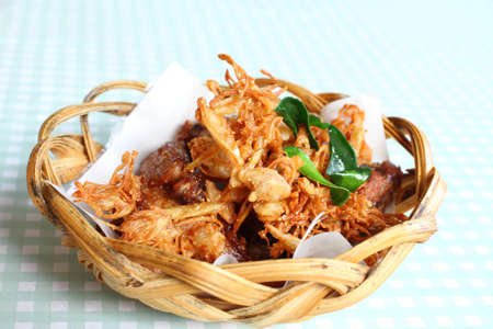 Thai style food, fried chicken with herb.の写真素材
