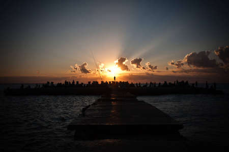 Sea sunrise photographed from a pontoon in the summerの写真素材