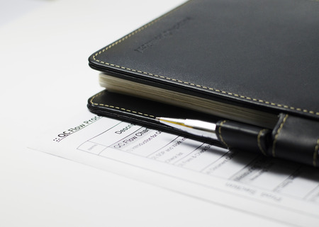 Business concept with books and penの写真素材