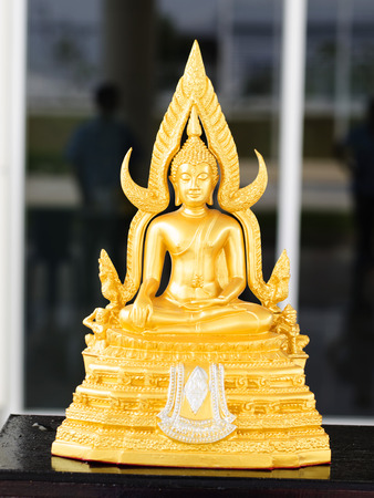 golden buddha statue close up backgroundの写真素材