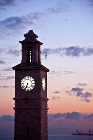 The Gibraltar Dockyard Tower glowing in the twilight.の写真素材
