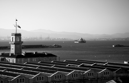 A black & white photo of the Gibraltar MOD Dockyard.