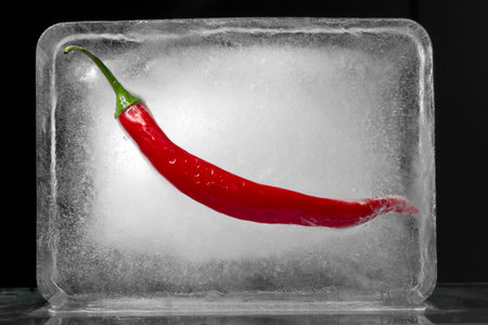 Chili frozen in a cube of ice