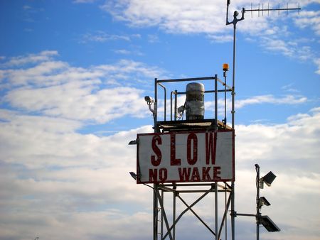Sign in channel advising "Slow, No Wake."の写真素材