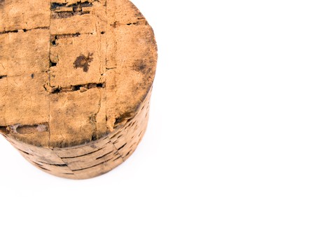 Big and old wine cork on white backgroundの写真素材