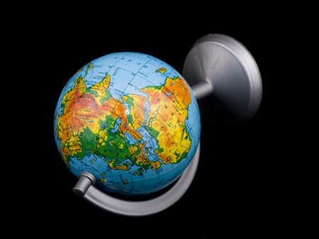 Small globe on black background