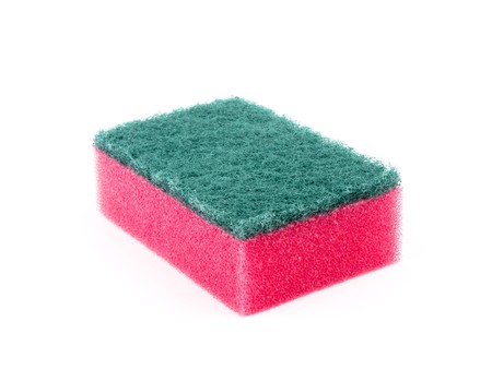 Washing red sponge on white backgroundの写真素材