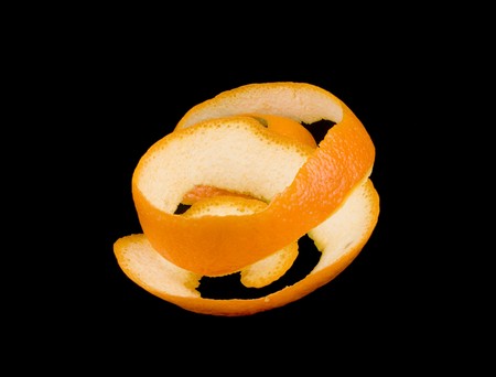 Orange peel on black backgroundの写真素材