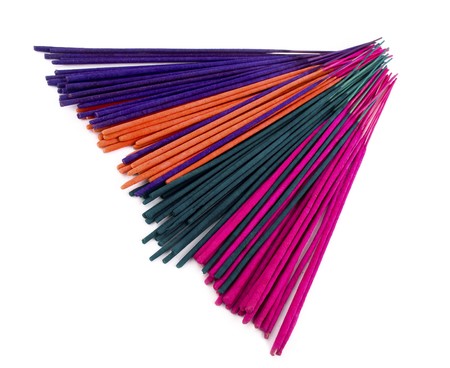 Colorful incenses on white backgroundの写真素材