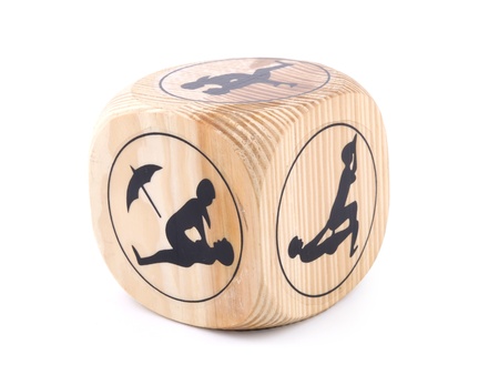 Erotic wooden cube on white backgroundの写真素材