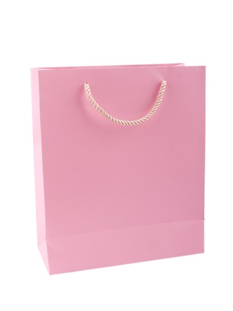 Elegant pink gift bag isolated on white backgroundの写真素材