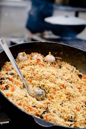 Street food market. Paella, fried rice. Kiev street market, Ukraineの写真素材