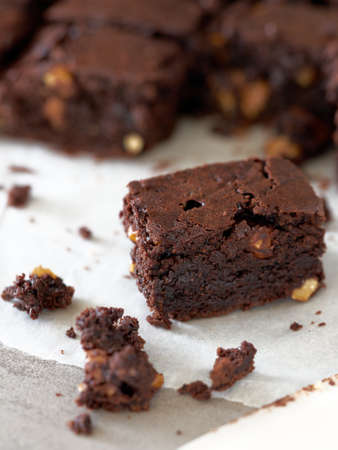 Chocolate brownie on a paper. Homemade bakery and dessert. Bakery, confectionery conceptの写真素材