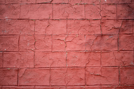 Worn out red brick wallの写真素材