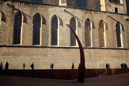 Barcelona, Spain - January 21st, 2012: People walk around a public square in Barcelona, Spain.のeditorial素材