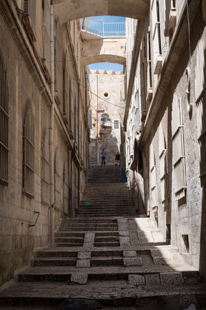 Jerusalem, Israel - March 17th, 2018: People walk the streets of the Old City of Jerusalem, Israel.のeditorial素材