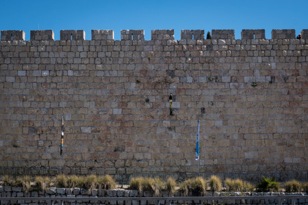 The wall of Jerusalem's Old City under blue sky