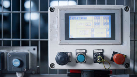 Factory machine screen controlling production process showing data closeup. Modern technological...