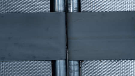 Closeup empty conveyor belt moving at modern automated manufacturing facility. Technological factory warehouse complex mechanical transportation line operating. Automation workplace conceptの写真素材