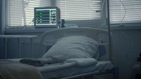 Empty hospital room interior with medical drip modern heartbeat computer screen. Patient history...