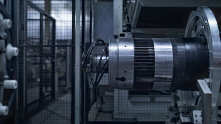 Closeup tyre building automat in modern robotic automated manufacture. Technological industrial...