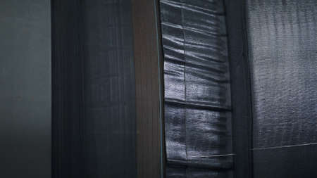 Closeup tyre production process in technological industrial workshop. Modern automated tire manufacturing at machinery automotive factory conveyor line. Industrialisation mechanism working conceptの写真素材