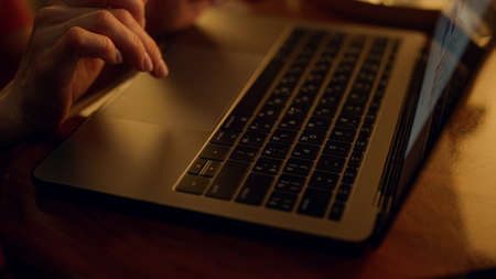 Ceo hands typing laptop computer in business trip closeup. Manager making report chart on corporate...