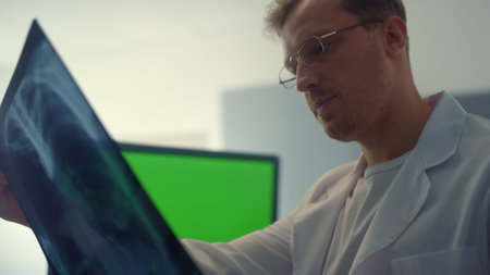 Chroma key computer monitor on online meeting doctor working health clinic close up. Professional...