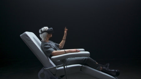 Creative man hands vr headset typing zoom on. Futuristic goggles blonde guy playing arms digital internet 3d universe slow motion. Next generation immersive social media online metaverse platformの写真素材