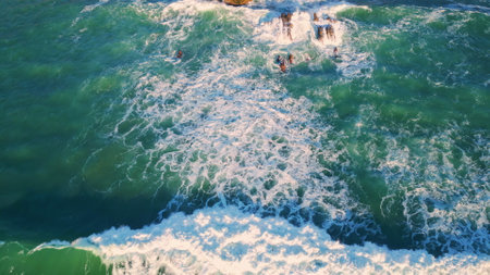 Powerful ocean washing shoreline closeup. Aerial view stunning foamy sea water splashing on seashore...