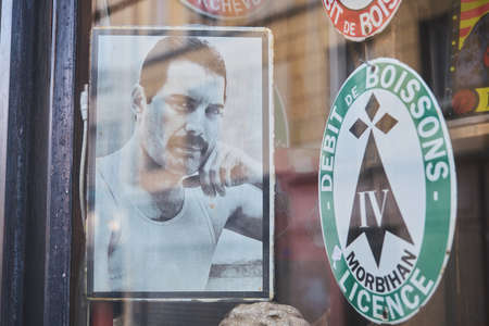 Paris, France - November 12, 2020: black and white picture of Freddie Mercury behind a window shop